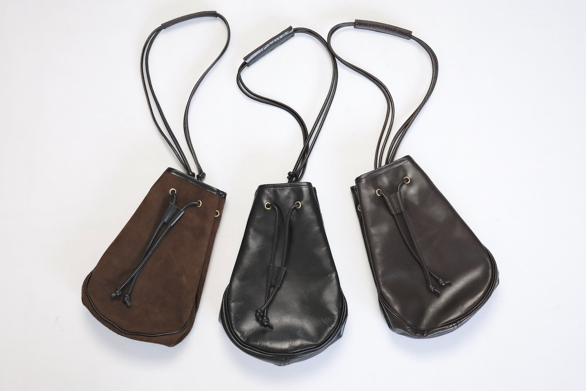 Inception by Accel Company Horsehide Pouch Bag  (Brown Tea-core)