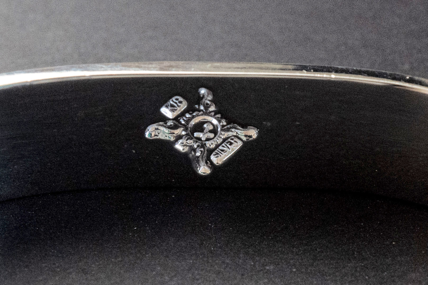 First Arrow's 12mm Arabesque Bangle with 18k Gold Sunburst Emblem (BR-026)