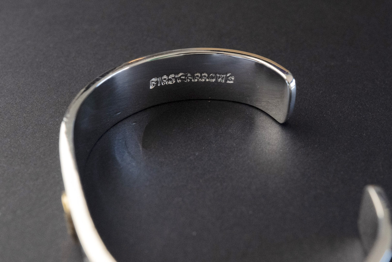 First Arrow's 12mm Arabesque Bangle with 18k Gold Sunburst Emblem (BR-026)