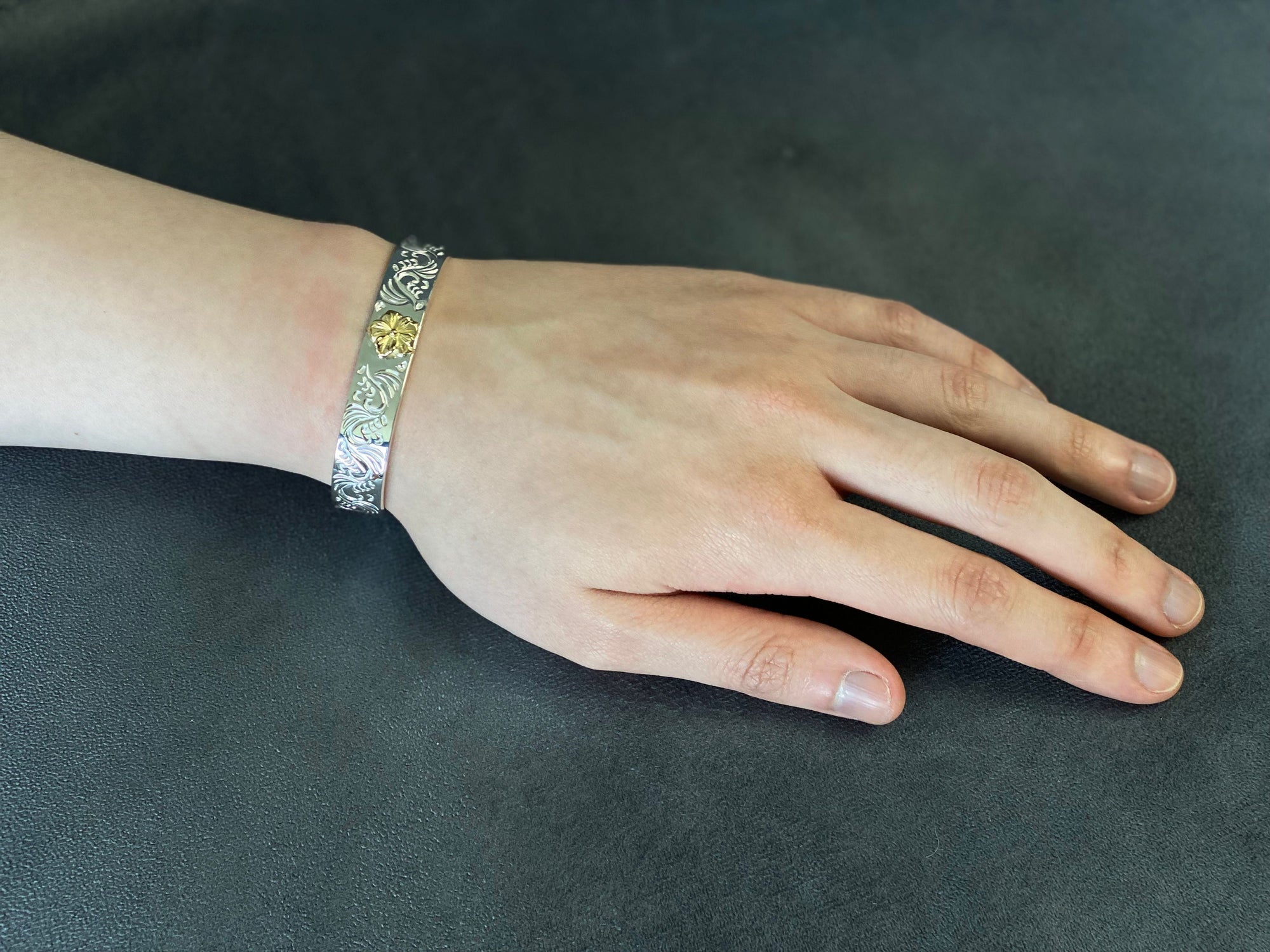 First Arrow's 12mm Arabesque Bangle with 18k Gold Sakura Flower (BR-027)
