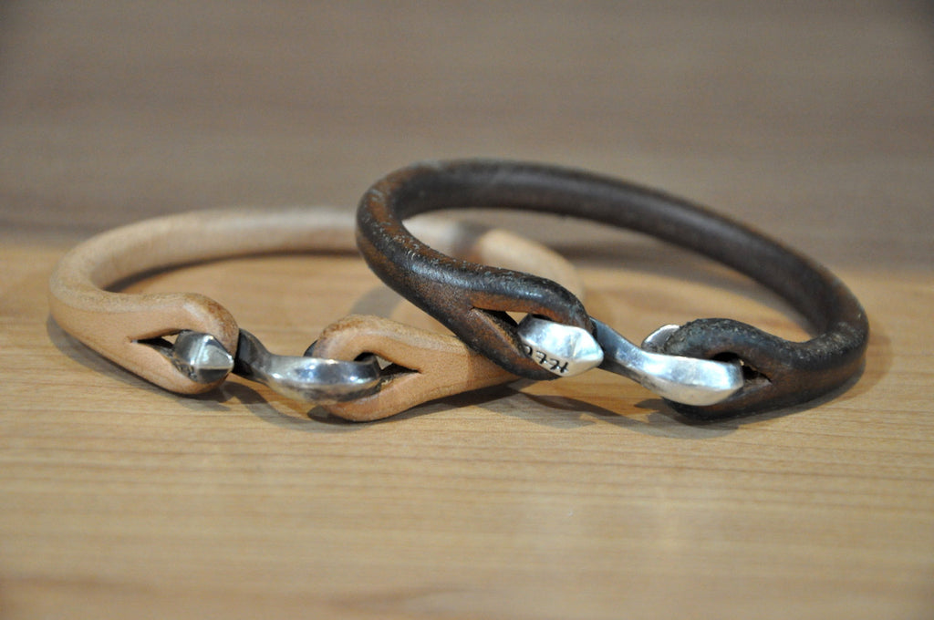 The Flat Head "Silver Hook" Single Cuff (Tan) one year in use