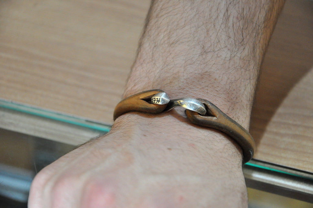 The Flat Head Silver Hook Cuff Natural Tan after 1/2 Year in use