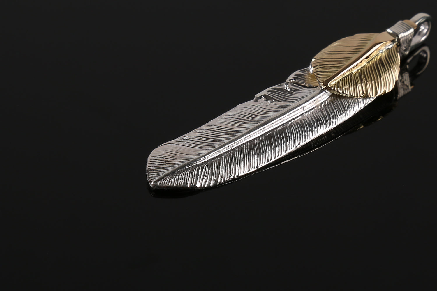 First Arrow's 18K Gold "Heart Feather" Pendants