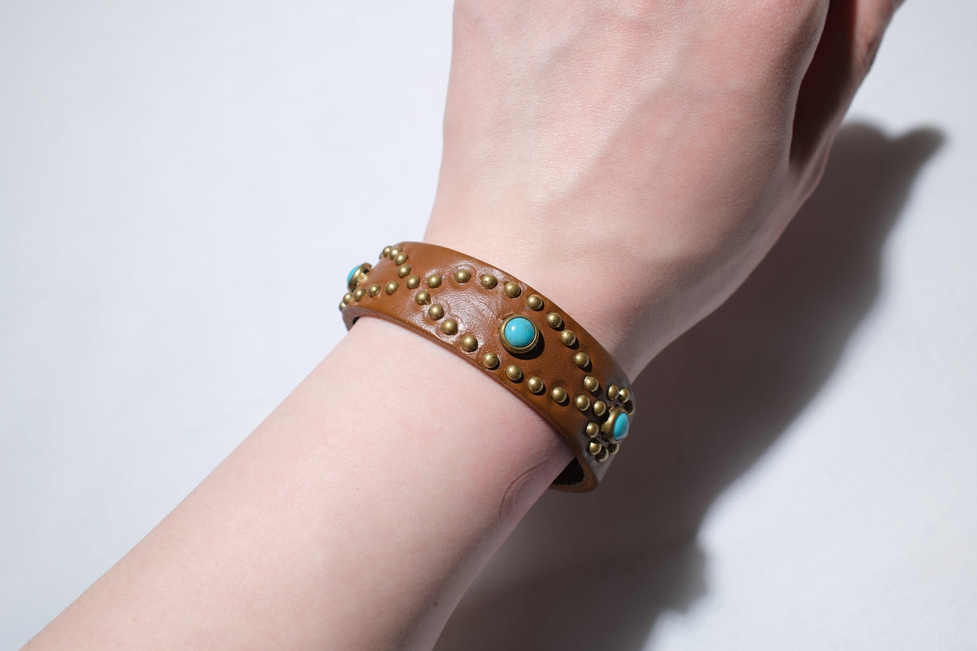 Hollywood Trading Company "Silent Watcher" Single Cuff with Turquoise (Light Brown Tea-core)
