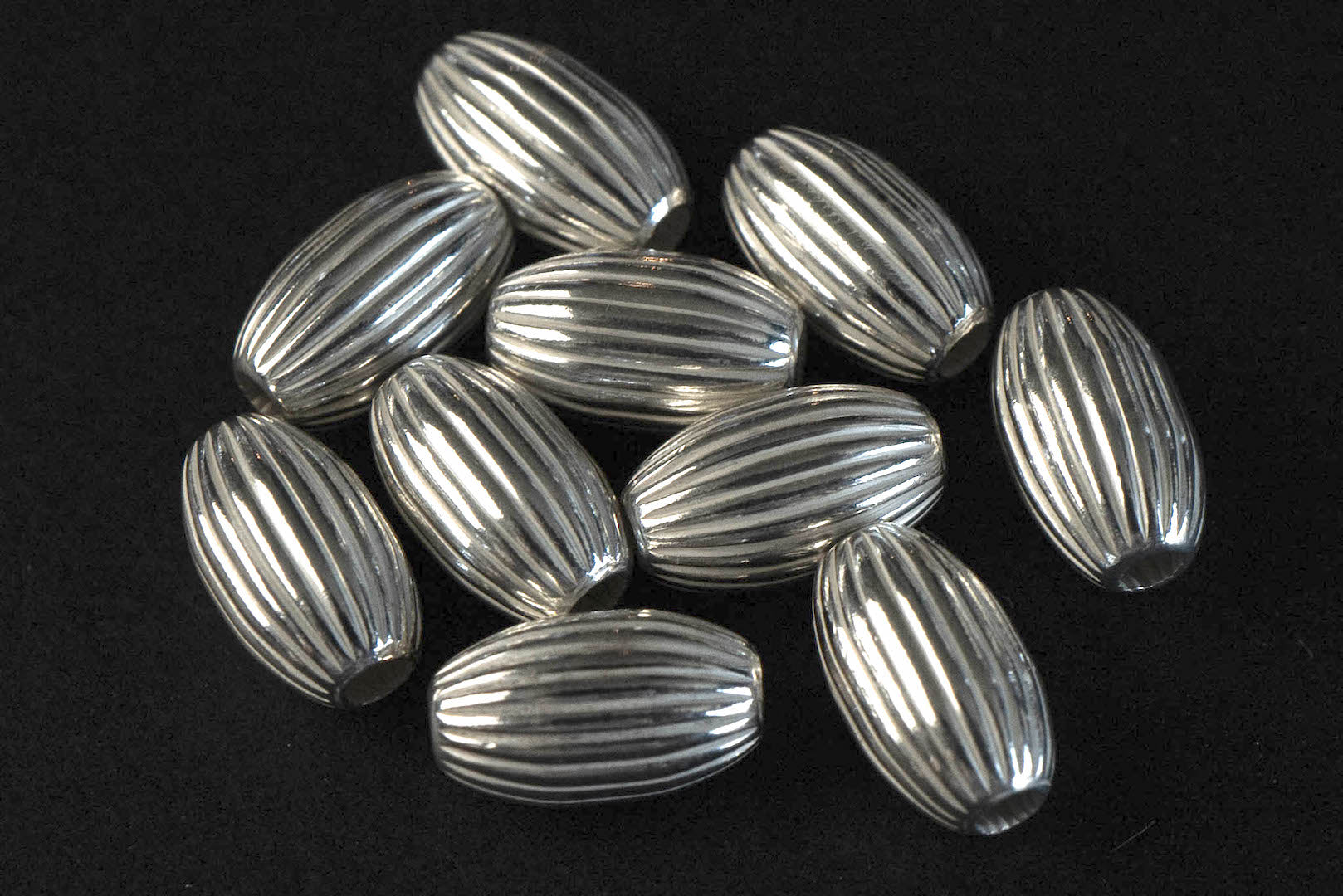 First Arrow's O-106 Silver Beads